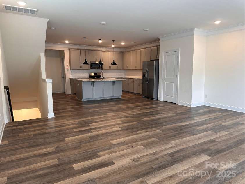 10207 Glenmere Creek Circle, Charlotte, NC 28262.  MLS# CAR4284626, YatesRealty ID 29245. Living room