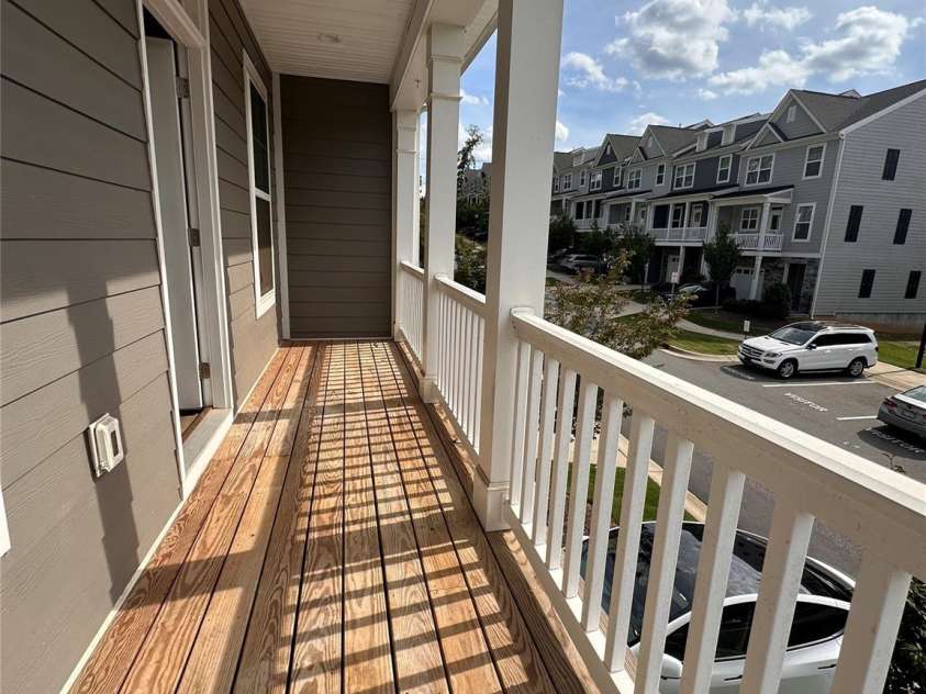 10207 Glenmere Creek Circle, Charlotte, NC 28262.  MLS# CAR4284626, YatesRealty ID 29245. Main living balcony