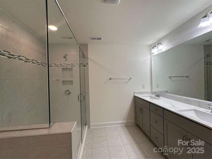 10207 Glenmere Creek Circle, Charlotte, NC 28262.  MLS# CAR4284626, YatesRealty ID 29245. Master bathroom 2 person vanity