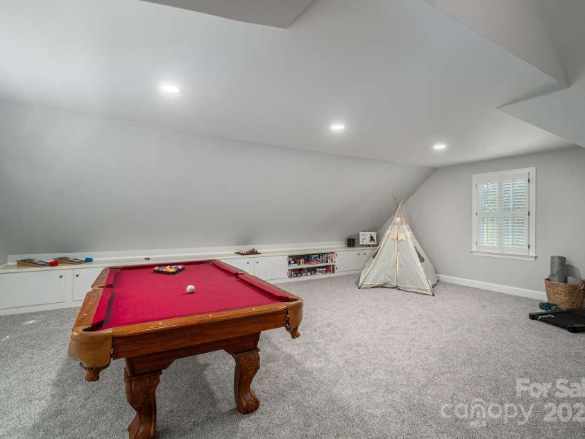 1705 Clubview Circle, Gastonia, NC 28056.  MLS# CAR4271543, YatesRealty ID 29247. Built-ins in bonus room for all your games, crafts or whatever you wish!