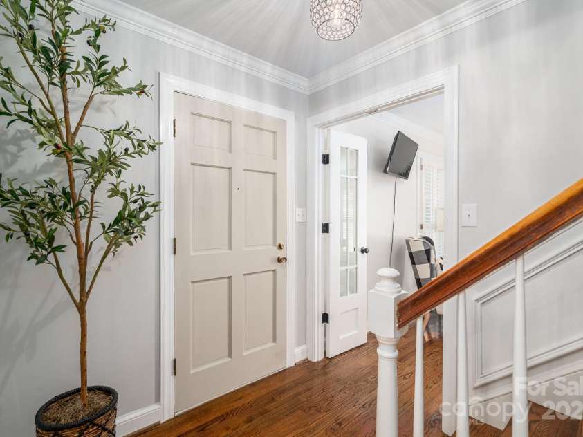 1705 Clubview Circle, Gastonia, NC 28056.  MLS# CAR4271543, YatesRealty ID 29247. Front door with office/living room with custom glass pane doors.