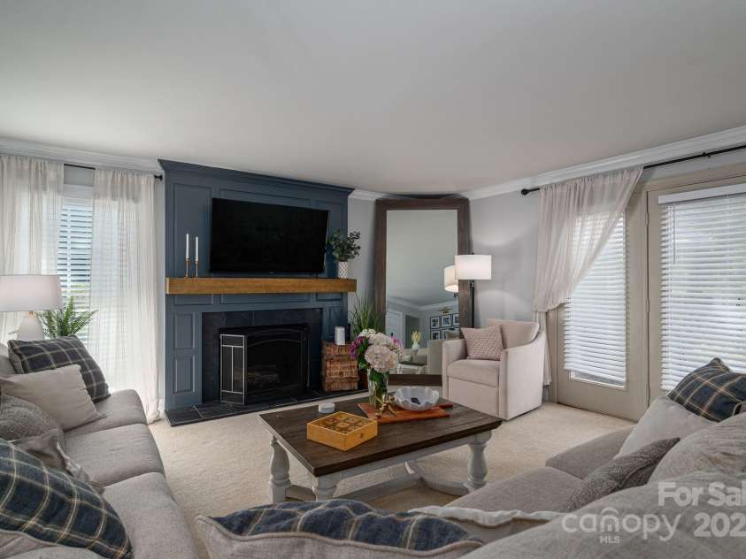 1705 Clubview Circle, Gastonia, NC 28056.  MLS# CAR4271543, YatesRealty ID 29247. GORGEOUS family room with fireplace that leads to back deck.