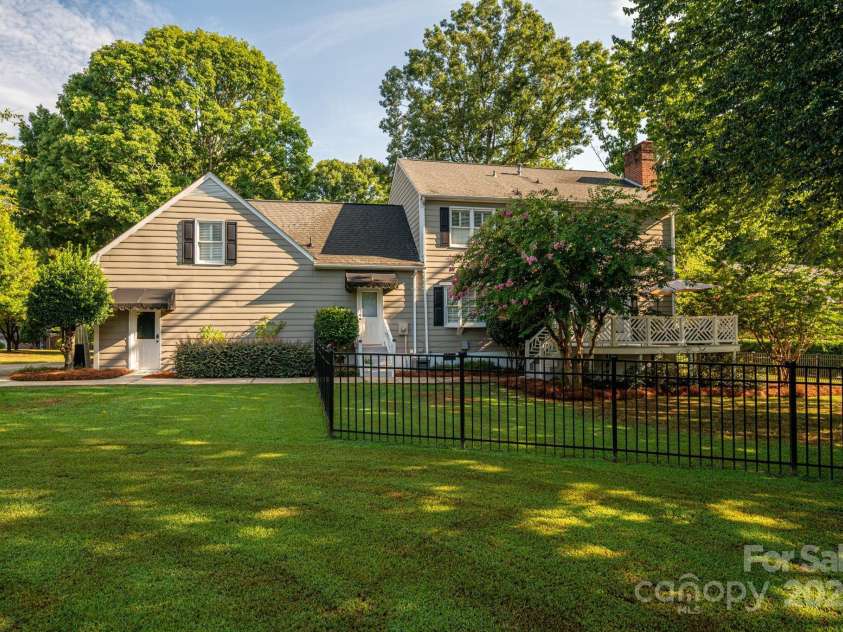 1705 Clubview Circle, Gastonia, NC 28056.  MLS# CAR4271543, YatesRealty ID 29247. This yard is gorgeous with solar lighting at night.