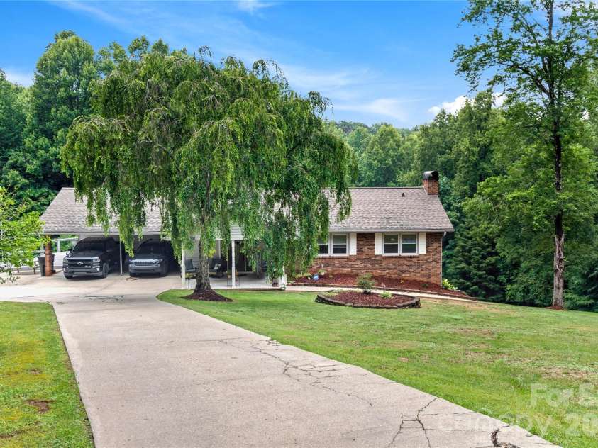 303 Alexander Drive, North Wilkesboro, NC 28659.  MLS# CAR4392007, YatesRealty ID 29249. 