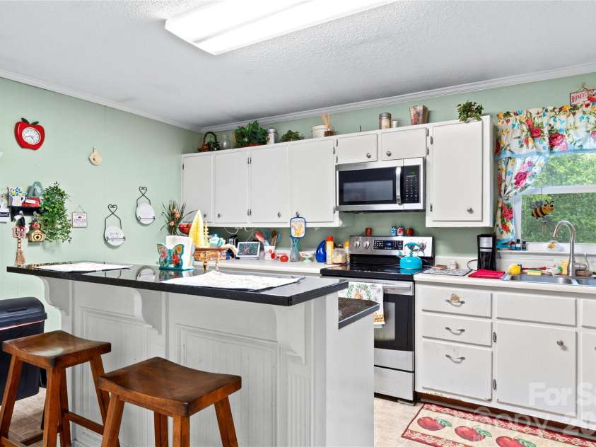 303 Alexander Drive, North Wilkesboro, NC 28659.  MLS# CAR4392007, YatesRealty ID 29249. 