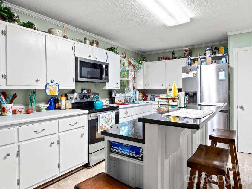 303 Alexander Drive, North Wilkesboro, NC 28659.  MLS# CAR4392007, YatesRealty ID 29249. 