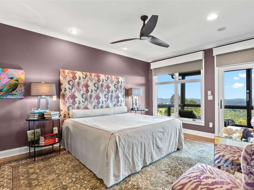159 Alta Circle, Hendersonville, NC 28739.  MLS# CAR4300821, YatesRealty ID 2925. Light filled primary bedroom on main level with exquisite views and screened porch!