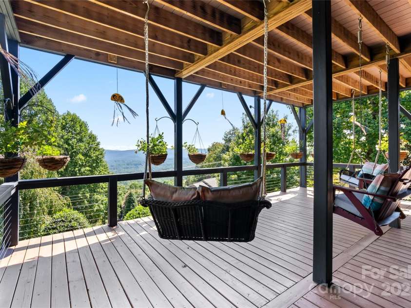 159 Alta Circle, Hendersonville, NC 28739.  MLS# CAR4300821, YatesRealty ID 2925. Settle in for a swing with a view!
