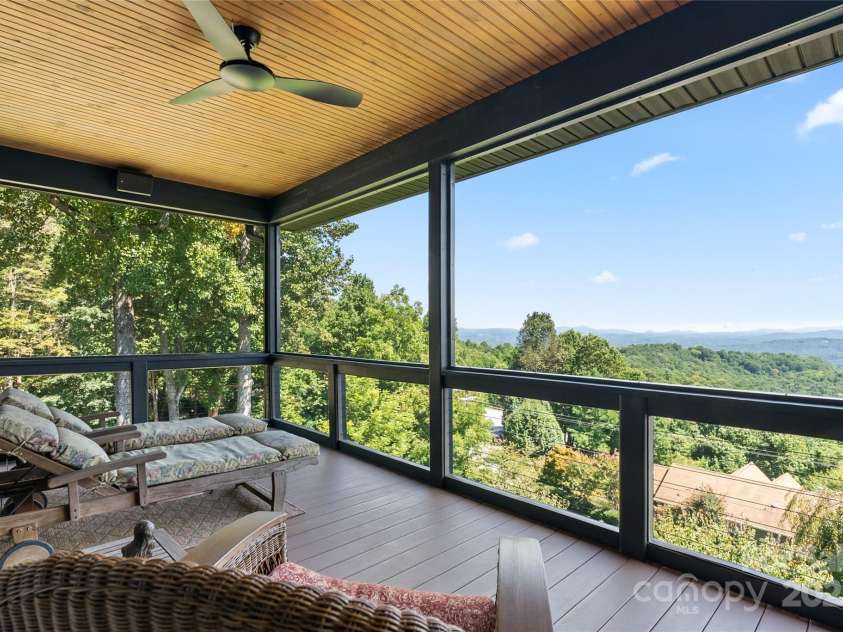 159 Alta Circle, Hendersonville, NC 28739.  MLS# CAR4300821, YatesRealty ID 2925. The screened porch is the perfect afternoon napping spot!