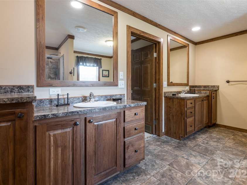 78 Hillcrest Drive, Candler, NC 28715.  MLS# CAR4286565, YatesRealty ID 29251. Double sinks!