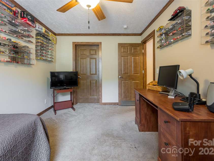 78 Hillcrest Drive, Candler, NC 28715.  MLS# CAR4286565, YatesRealty ID 29251. Third bedroom with walk-in closet