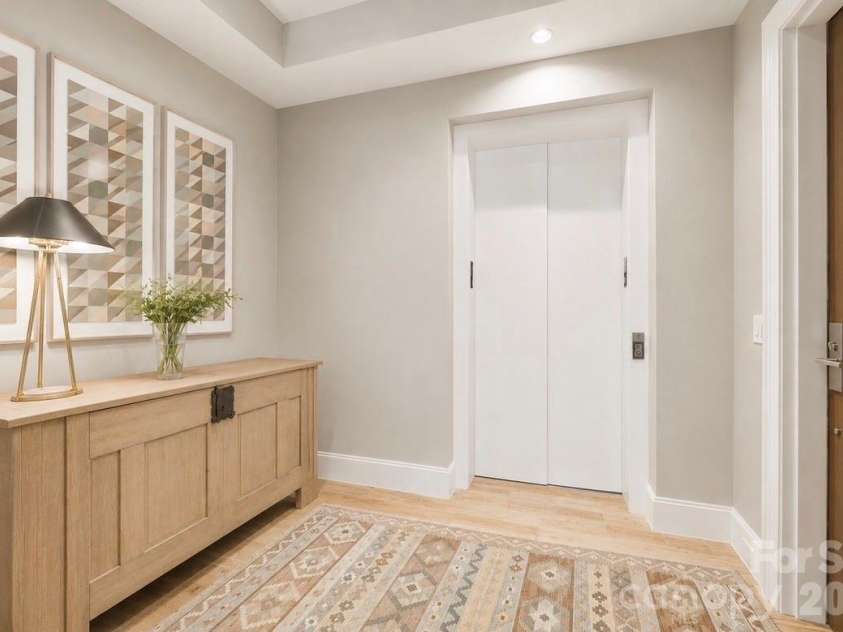 130 Cherokee Road, Charlotte, NC 28207.  MLS# CAR4370948, YatesRealty ID 29262. Private Elevator Foyer