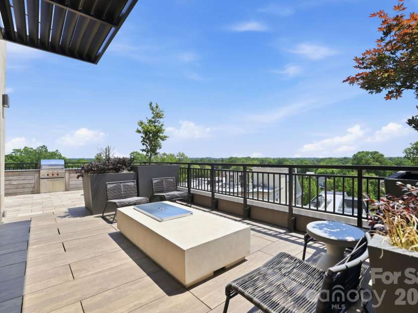 130 Cherokee Road, Charlotte, NC 28207.  MLS# CAR4370948, YatesRealty ID 29262. Rooftop Firepit