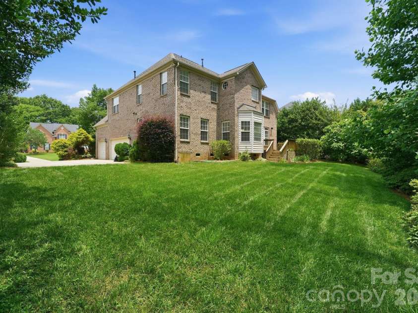 8719 Beaminster Place, Waxhaw, NC 28173.  MLS# CAR4390694, YatesRealty ID 29267. Back Yard