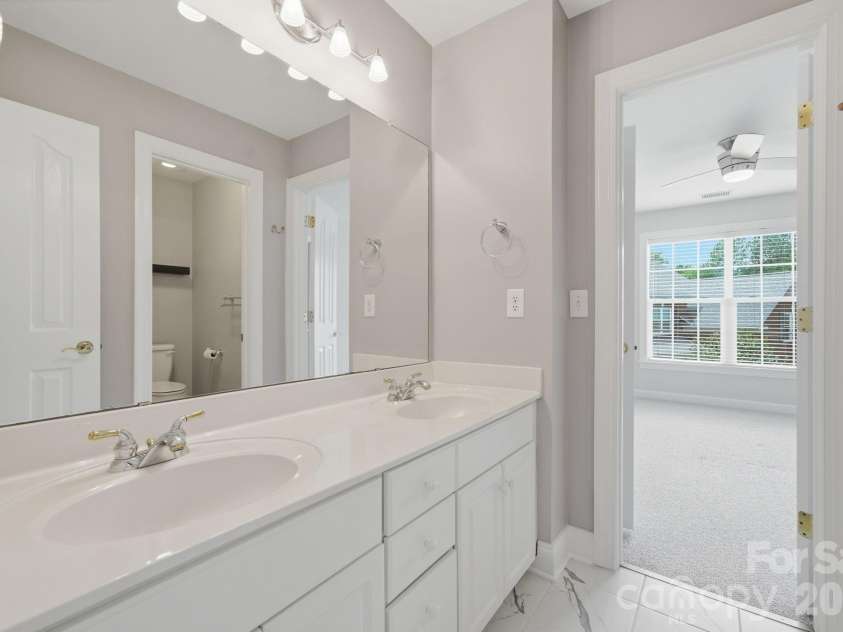 8719 Beaminster Place, Waxhaw, NC 28173.  MLS# CAR4390694, YatesRealty ID 29267. Jack-and-Jill Bathroom