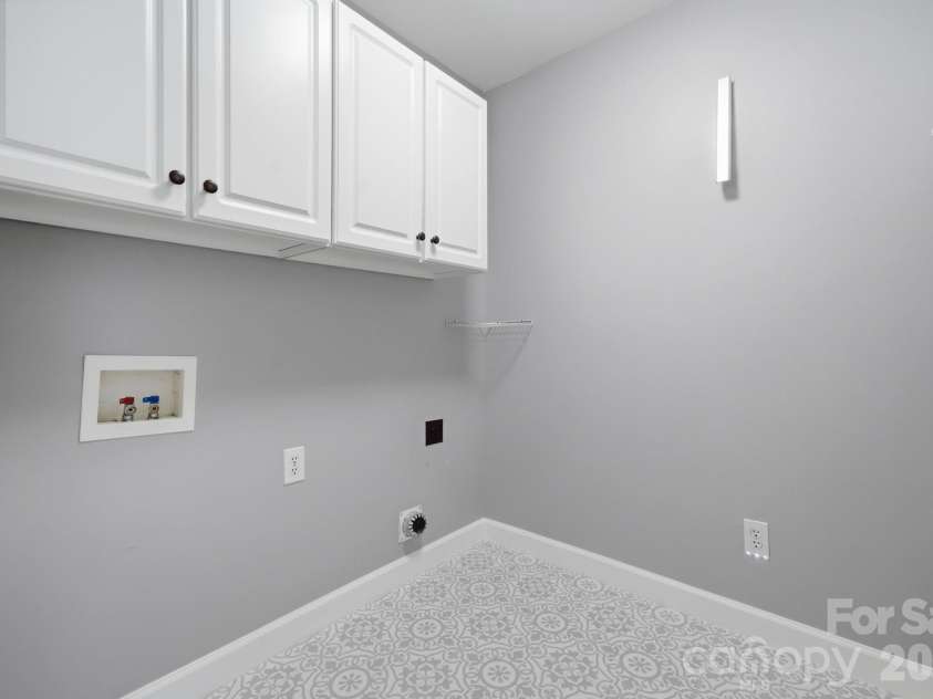 8719 Beaminster Place, Waxhaw, NC 28173.  MLS# CAR4390694, YatesRealty ID 29267. Laundry Room
