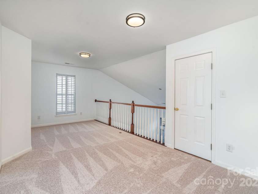 3822 Carl Parmer Drive, Harrisburg, NC 28075.  MLS# CAR4223446, YatesRealty ID 2927. Loft area upstairs is the perfect area for a second hangout area, play area, den