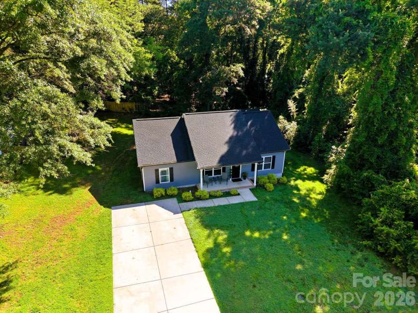 204 Price Street, Mount Holly, NC 28120.  MLS# CAR4389857, YatesRealty ID 29271. Oversized Driveway