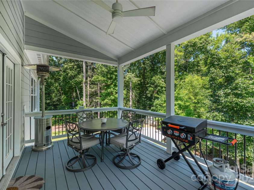 348 Olivet Lane, Fletcher, NC 28732.  MLS# CAR4287299, YatesRealty ID 29273. Covered rear deck for extra dining space or grilling in the shade