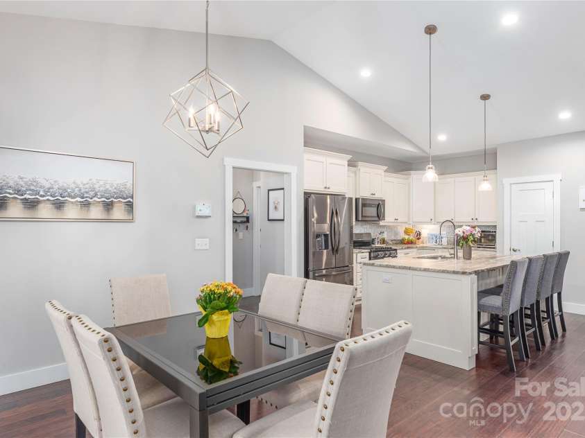 348 Olivet Lane, Fletcher, NC 28732.  MLS# CAR4287299, YatesRealty ID 29273. Dining to kitchen view