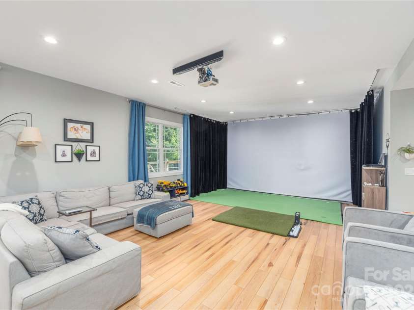 348 Olivet Lane, Fletcher, NC 28732.  MLS# CAR4287299, YatesRealty ID 29273. Enormous family/recreation room downstairs