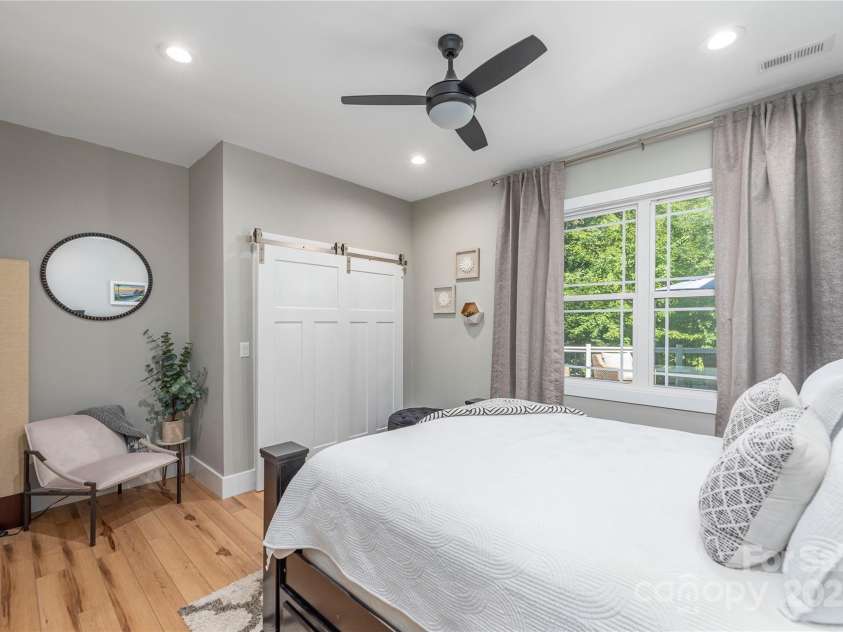 348 Olivet Lane, Fletcher, NC 28732.  MLS# CAR4287299, YatesRealty ID 29273. Lower extra room for guests or a downstairs office.