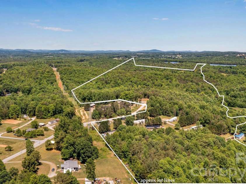 21 Little River Estates Drive, Taylorsville, NC 28681.  MLS# CAR4390374, YatesRealty ID 29275. Aerial View - Lot Lines are Approximate