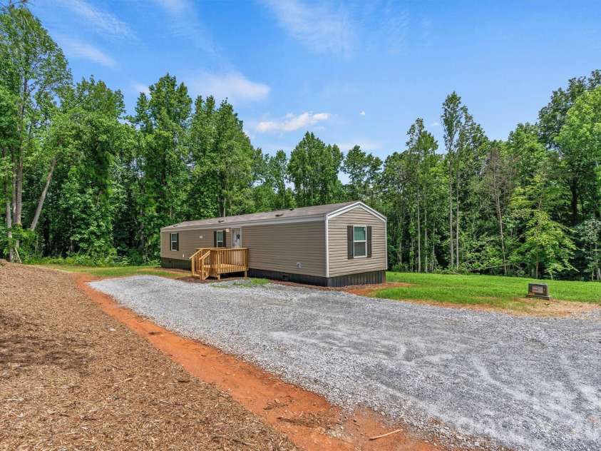 21 Little River Estates Drive, Taylorsville, NC 28681.  MLS# CAR4390374, YatesRealty ID 29275. New Home/Focused Parking View (Total of 3 New Homes)