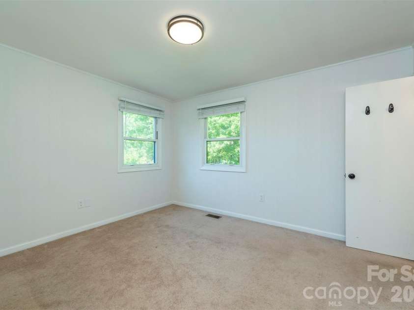 34 Goldmont Street, Black Mountain, NC 28711.  MLS# CAR4380870, YatesRealty ID 29277. Third Bedroom