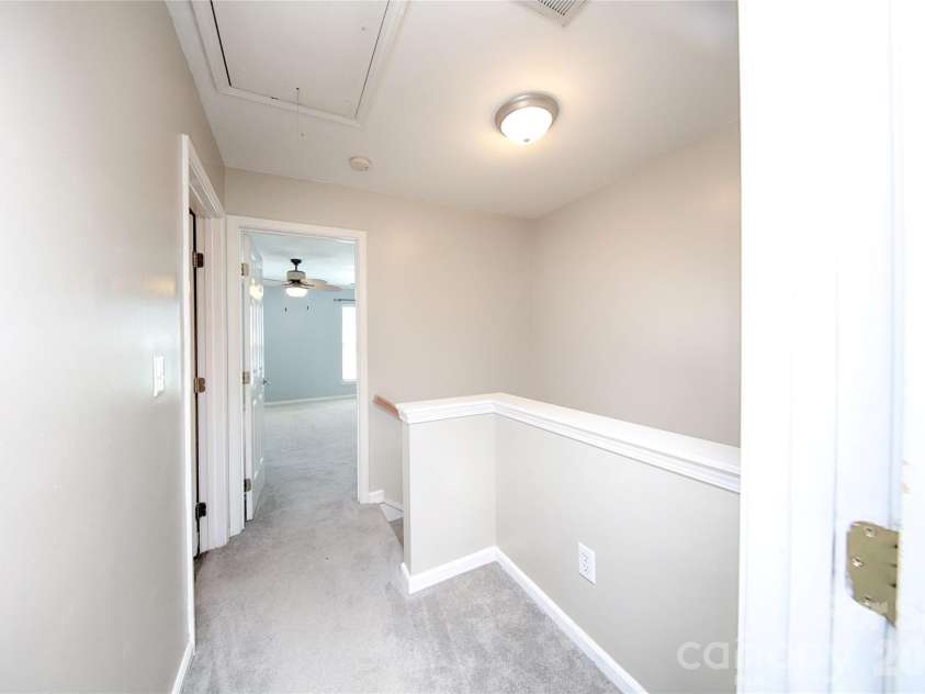 14556 Reese Boulevard, Huntersville, NC 28078.  MLS# CAR4380745, YatesRealty ID 29278. 2nd Floor hallway connecting Primary Suite, 2nd Bedroom & 2nd Full Bathroom