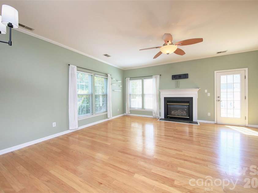 14556 Reese Boulevard, Huntersville, NC 28078.  MLS# CAR4380745, YatesRealty ID 29278. 2nd Floor Living Room and Dining Area with Hardwood Flooring