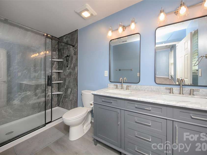 14556 Reese Boulevard, Huntersville, NC 28078.  MLS# CAR4380745, YatesRealty ID 29278. Beautifully Remodeled Primary Bathroom with Luxury Vinyl Plank flooring