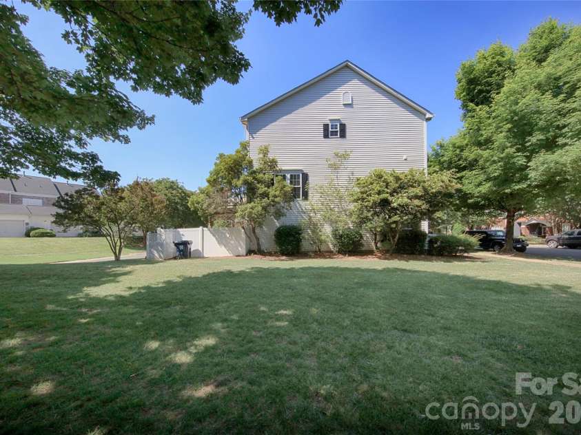 14556 Reese Boulevard, Huntersville, NC 28078.  MLS# CAR4380745, YatesRealty ID 29278. Lots of green space to enjoy surrounding the townhome