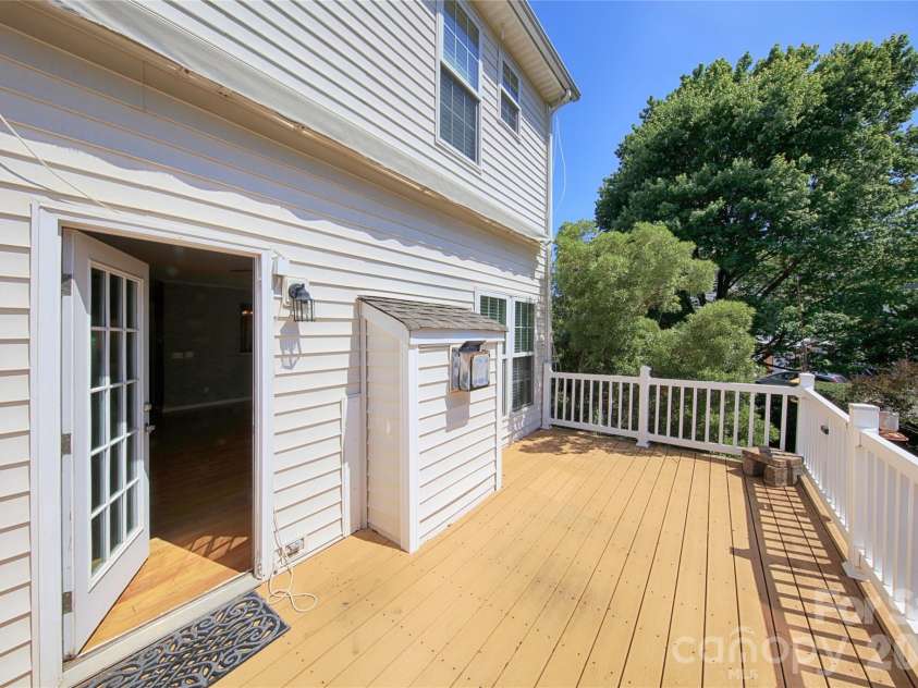 14556 Reese Boulevard, Huntersville, NC 28078.  MLS# CAR4380745, YatesRealty ID 29278. Perks of an end unit!  Extra large Deck.  