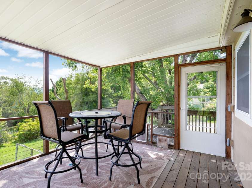 31 Skyland Circle, Asheville, NC 28804.  MLS# CAR4284823, YatesRealty ID 29278. Another view inside the porch