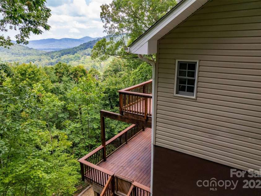 16 Skyview Court, Asheville, NC 28803.  MLS# CAR4274692, YatesRealty ID 29279. View several Mt ranges!