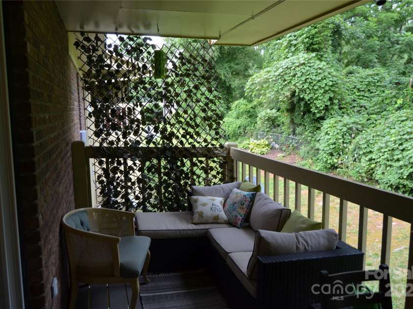 380 Corbly Drive, Hendersonville, NC 28739.  MLS# CAR4278581, YatesRealty ID 29280. Back Porch