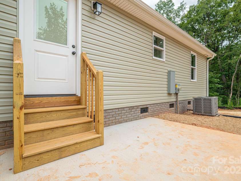 1964 Noles Circle, Lincolnton, NC 28092.  MLS# CAR4285826, YatesRealty ID 29281. Back patio