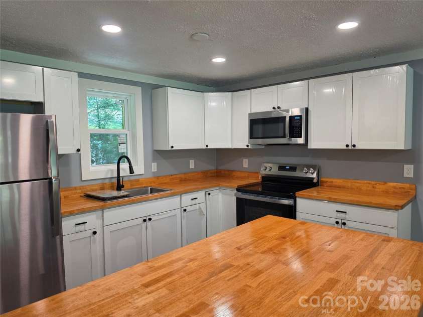 140 Nestle Road, Boone, NC 28607.  MLS# CAR4388895, YatesRealty ID 29283. 