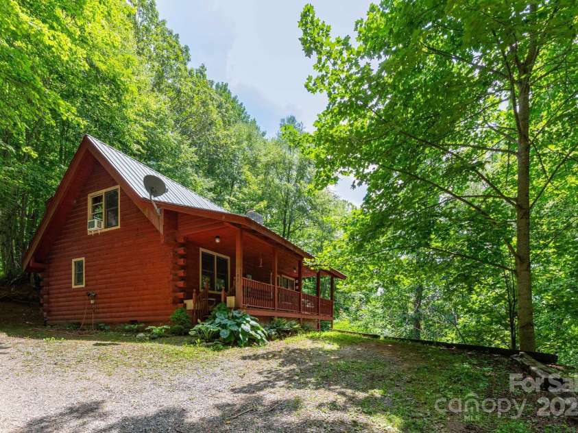 192 Granny Shepherd Road, Mars Hill, NC 28754.  MLS# CAR4285512, YatesRealty ID 29292. 2BR, 2BA Log Cabin on 1 acre