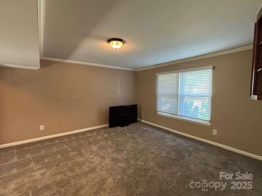 6340 Ellesmere Court, Mint Hill, NC 28227.  MLS# CAR4276855, YatesRealty ID 29296. Lower level flex space