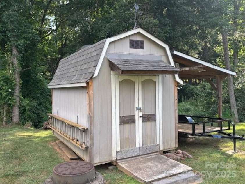 6340 Ellesmere Court, Mint Hill, NC 28227.  MLS# CAR4276855, YatesRealty ID 29296. Storage Building