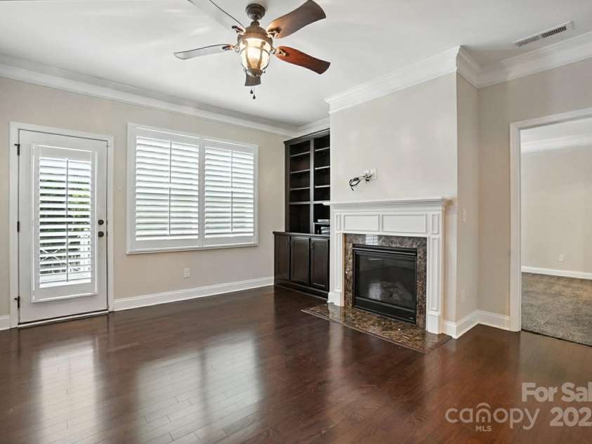 4128 La Crema Drive, Charlotte, NC 28214.  MLS# CAR4284944, YatesRealty ID 29298. Gorgeous flooring flows throughout spaces flooded with natural light, all complemented by year-round, captivating lake views