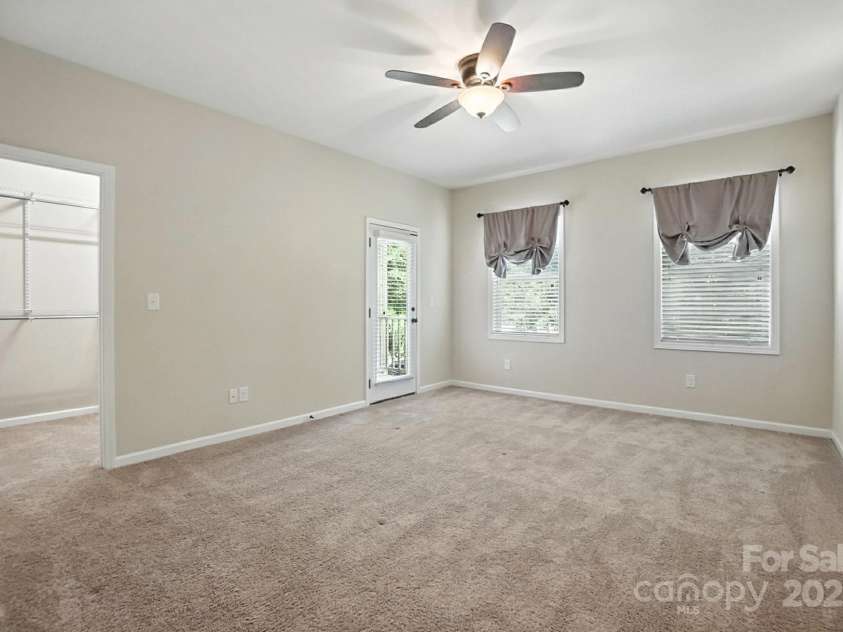 4128 La Crema Drive, Charlotte, NC 28214.  MLS# CAR4284944, YatesRealty ID 29298. Secondary bedroom with balcony and walk in closet
