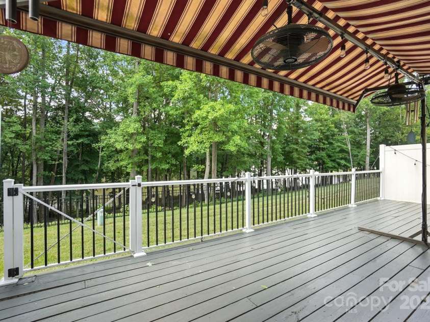 4128 La Crema Drive, Charlotte, NC 28214.  MLS# CAR4284944, YatesRealty ID 29298. Step out onto your deck and instantly feel the day's stresses melt away as you relax and soak in the serene lake views