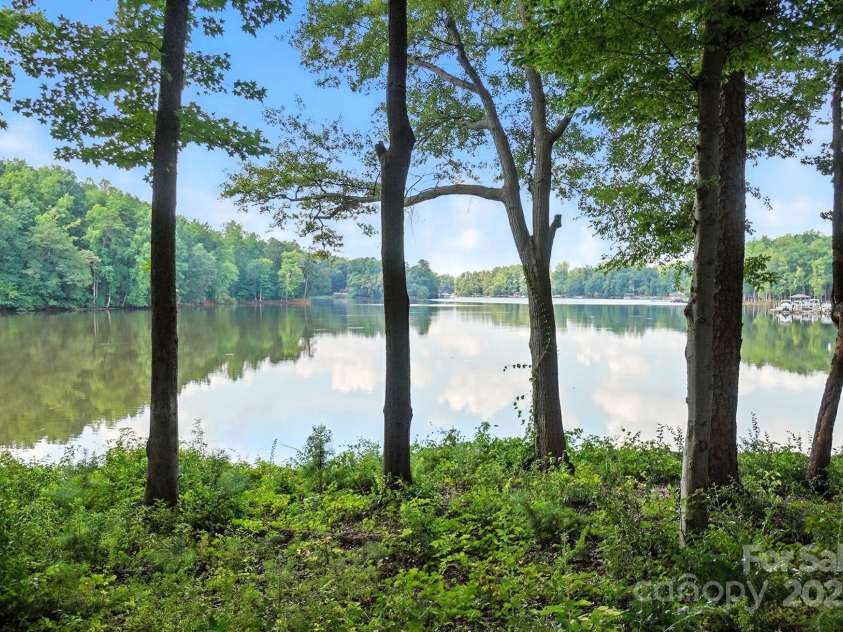 4128 La Crema Drive, Charlotte, NC 28214.  MLS# CAR4284944, YatesRealty ID 29298. Stunning water-view townhome, perfectly situated in the highly sought-after The Vineyards on Lake Wylie