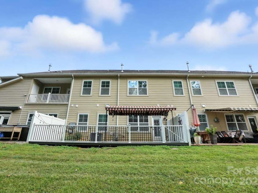 4128 La Crema Drive, Charlotte, NC 28214.  MLS# CAR4284944, YatesRealty ID 29298. This is not just a home; it's a lifestyle, offering an impressive array of resort-style amenities including lush community gardens, picturesque walking trails, refreshing swimming pools, a championship tennis court, a 