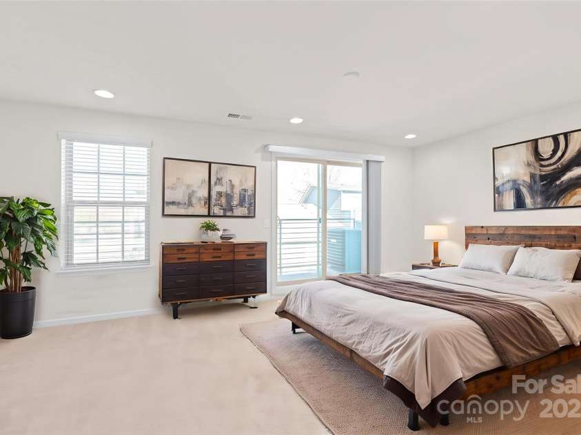 1304 Queen Lyon Court, Charlotte, NC 28205.  MLS# CAR4213262, YatesRealty ID 2930. Fourth floor suite with full bathroom and private terrace!