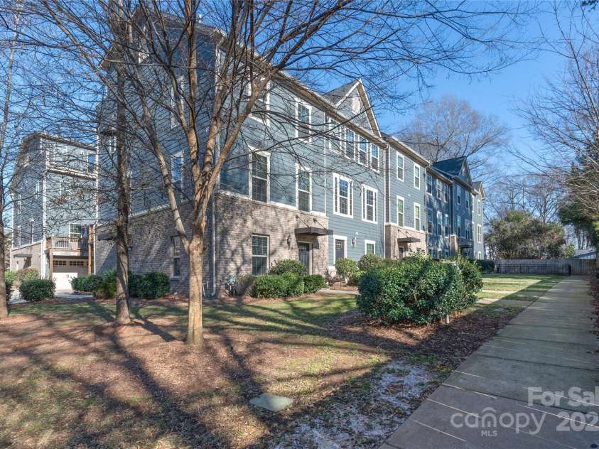 1304 Queen Lyon Court, Charlotte, NC 28205.  MLS# CAR4213262, YatesRealty ID 2930. Quaint green space right out front!