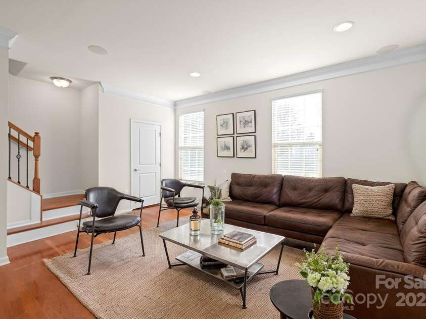 1304 Queen Lyon Court, Charlotte, NC 28205.  MLS# CAR4213262, YatesRealty ID 2930. Virtually staged living room